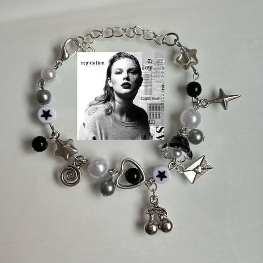 Reputation charm braceletBlack white and grey charm bracelet inspired by Taylor Swift’s album reputation,Perfect eras tour vibes