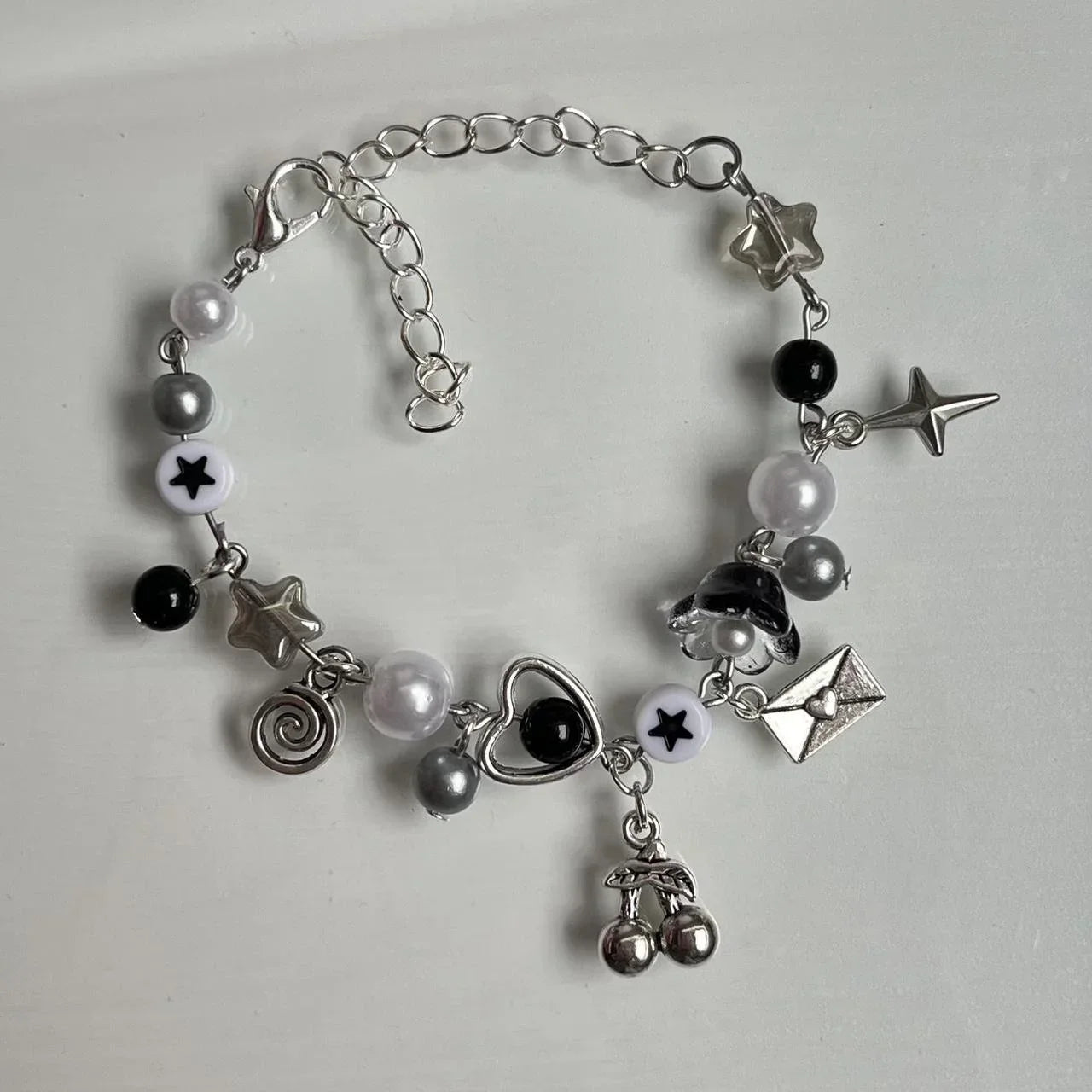 Reputation charm braceletBlack white and grey charm bracelet inspired by Taylor Swift’s album reputation,Perfect eras tour vibes